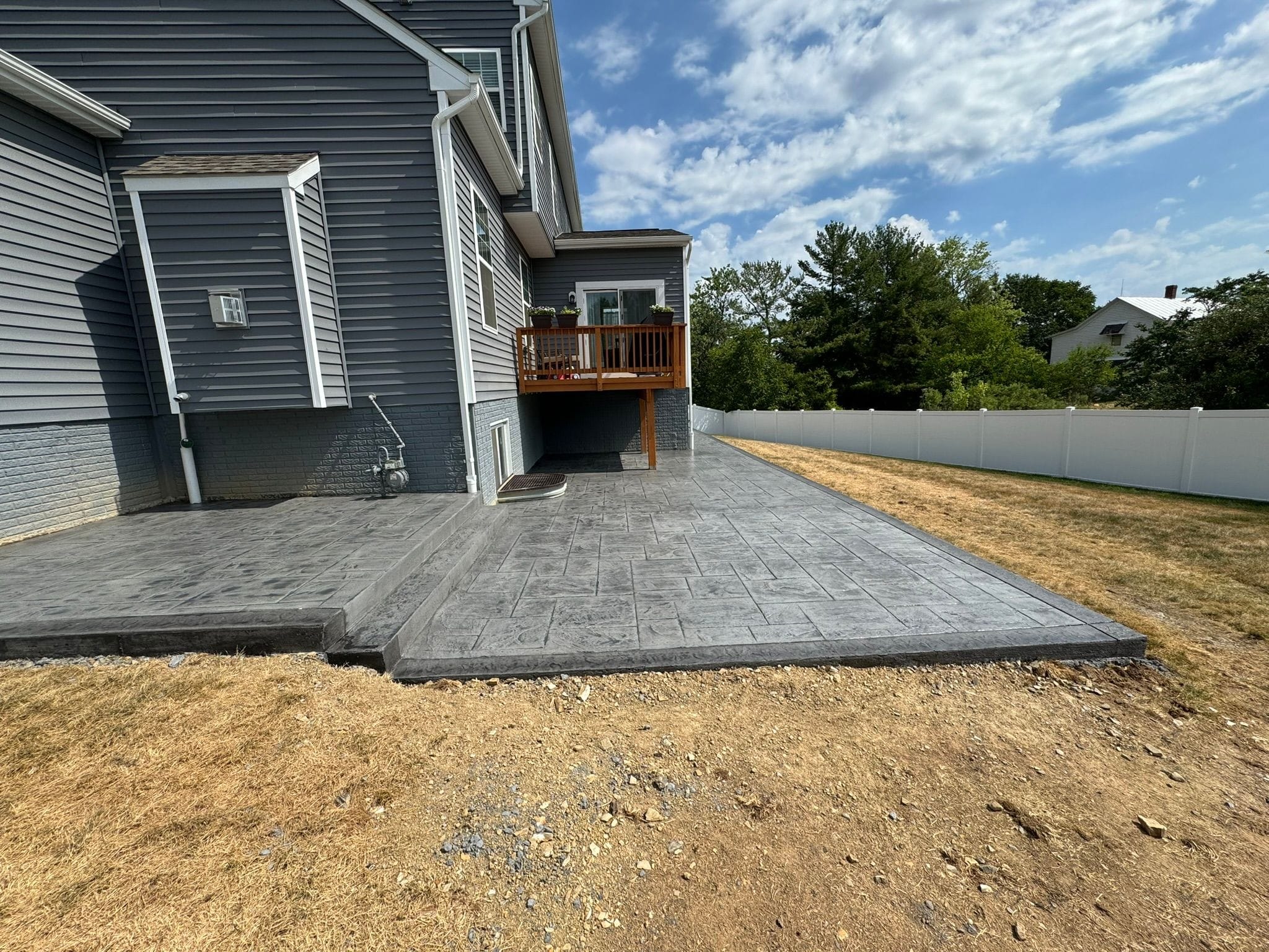 Local Stamped Concrete Installer | Stamped Concrete Wrap-Around Patio