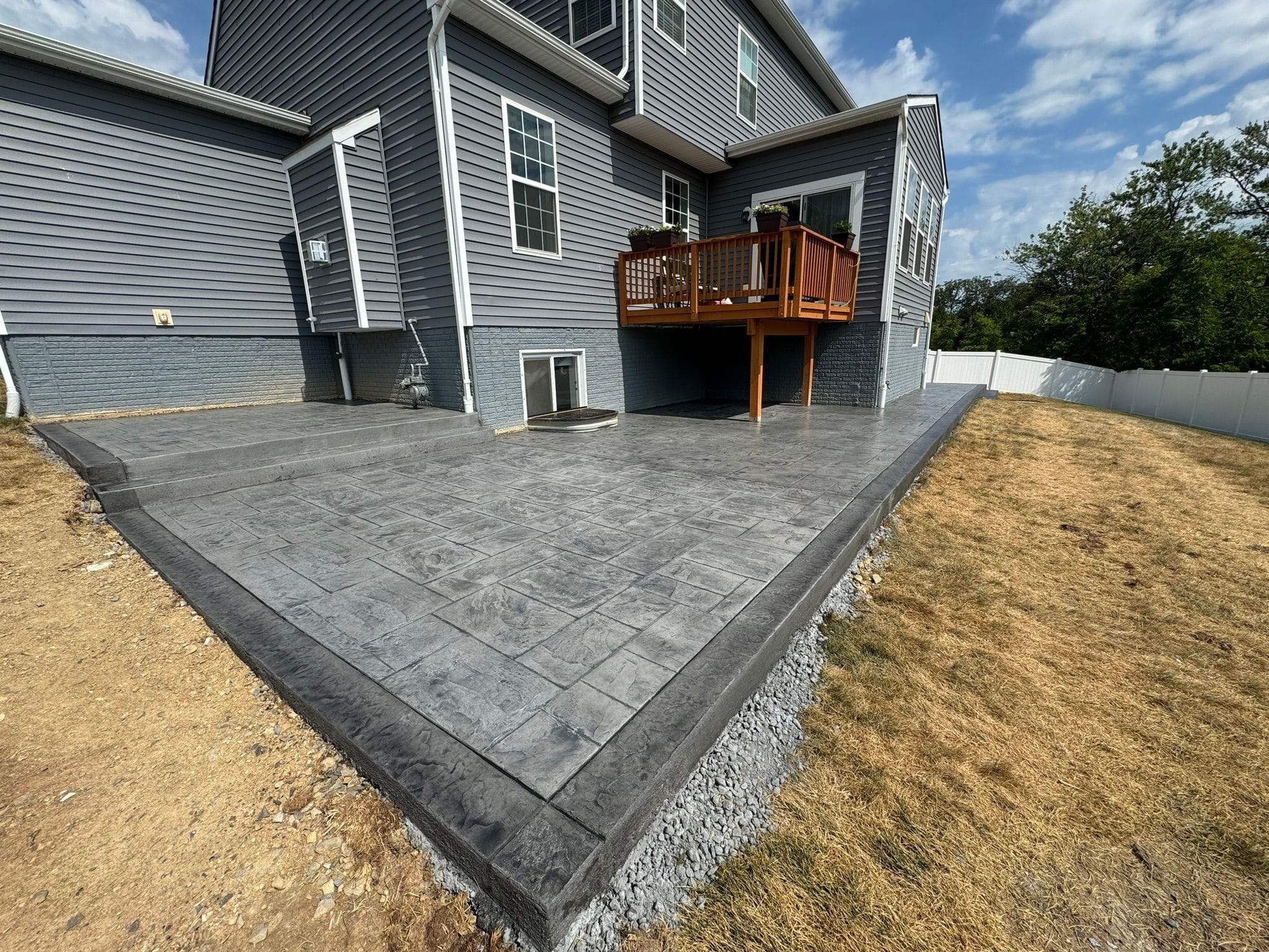 Local Stamped Concrete Installer | Stamped Concrete Wrap-Around Patio